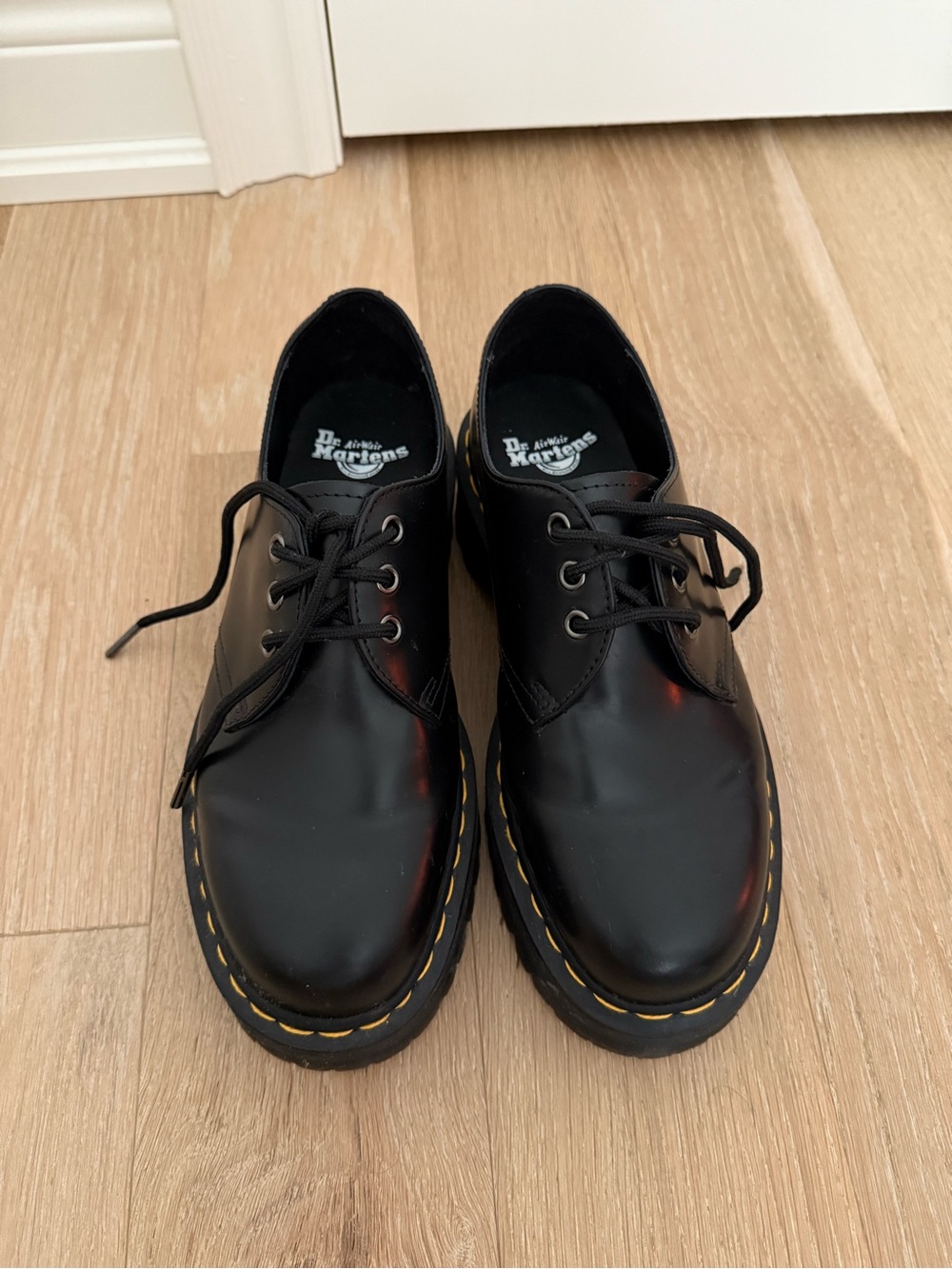 Dr. Martens Black Leather Platforms with Yellow Stitching